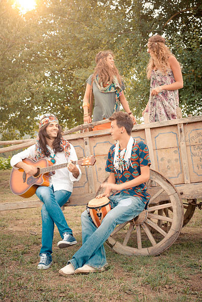 istock Hippie group singing and dancing on a cart 153195620