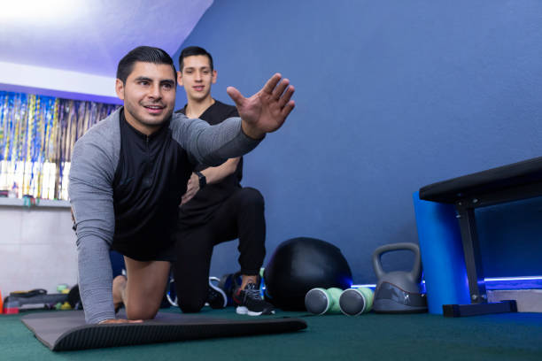 istock athlete performing exercises in physiotherapy 1531971420
