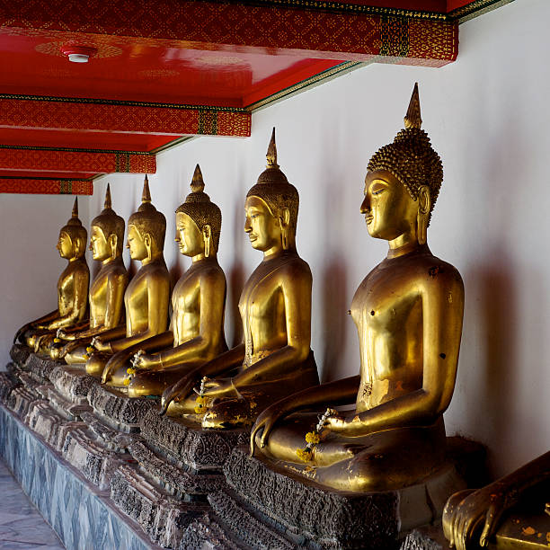 istock Golden Buddha statues in the temple 153197434