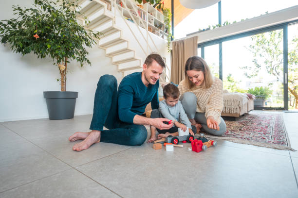 istock Loving Young Parents Playing With Their Boy 1531979575