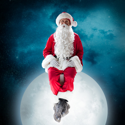 Santa riding the moon. On night sky background