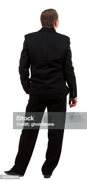 Vista Posterior De Un Hombre De Negocios En Traje Negro Frente Foto de stock y más banco de imágenes de De atrás hacia adelante