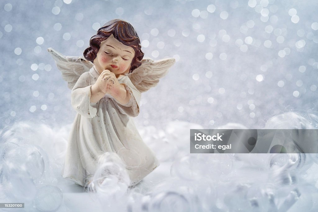 Christmas angel Christmas angel on silver background Advent Stock Photo