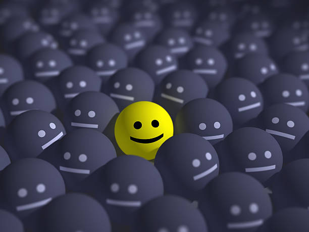 istock smile in the middle of grey crowd 153201456
