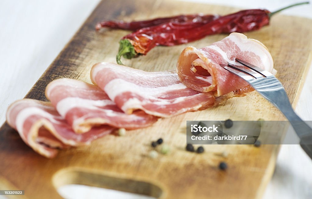 Tranches de bacon et Fourchette - Photo de Aliment libre de droits