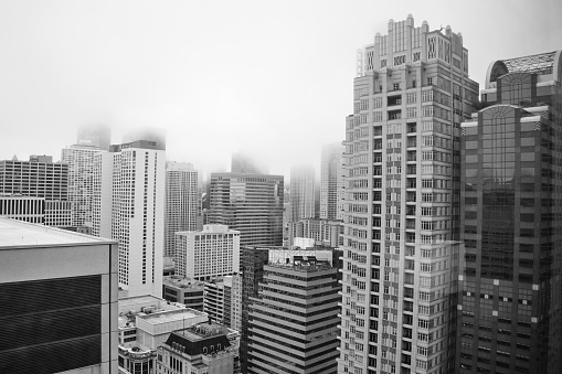 Chicago in B&W. Chicago is famous for highriseres and here we get to see some of them covered in cloud.