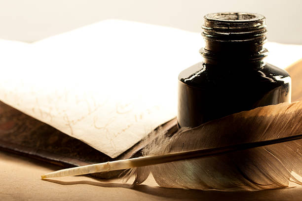 istock Old book with feather and inkpot 153203300