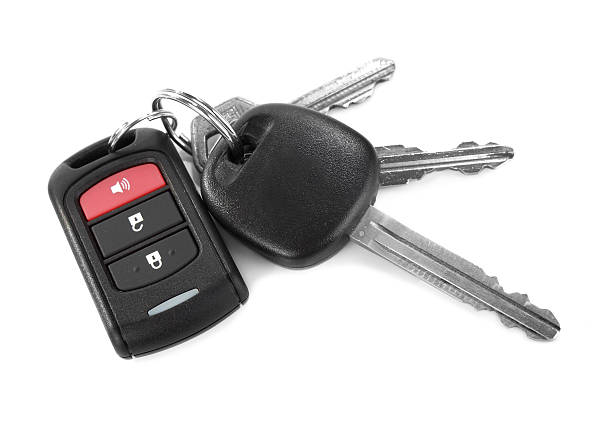 remote car key remote car key isolated on white background car key photos stock pictures, royalty-free photos & images