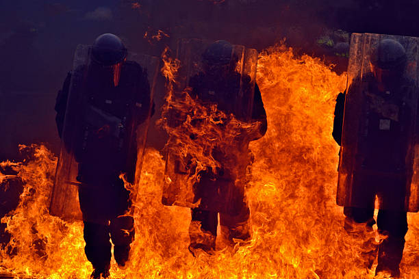 istock UK Riot Police Flames 153203806