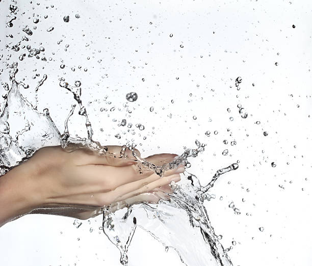 istock water  in woman hand 153203982