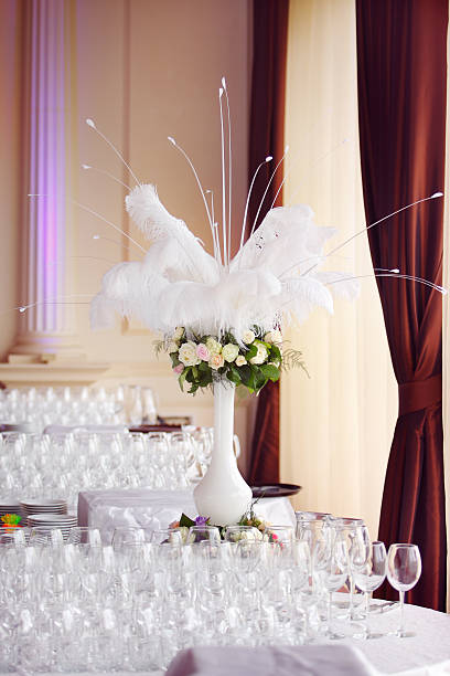 istock bouquet of roses with white peacock feathers 153204391