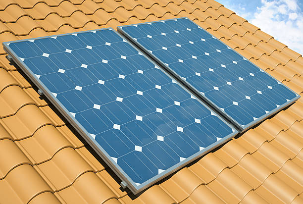 istock Solar Panels on a roof with orange tiles 153204473