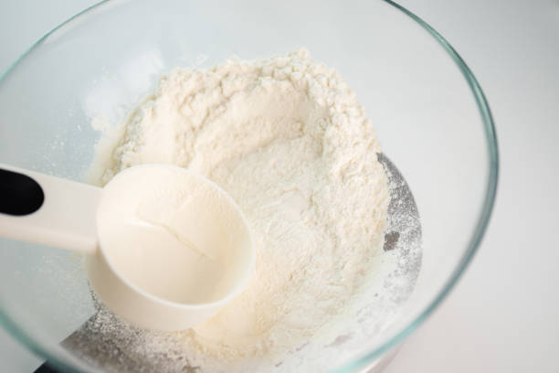 istock dough and pastry preparation, flour in a bowl on an electronic kitchen scales, 1532053395