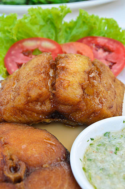 istock King Mackerel fried pieces, pour sauce 153205801