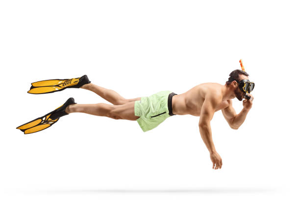 istock Man snorkeling with fins and a mask 1532068220