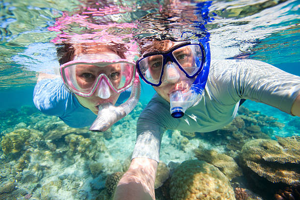 istock A couple snorkeling together on shallow water 153208251