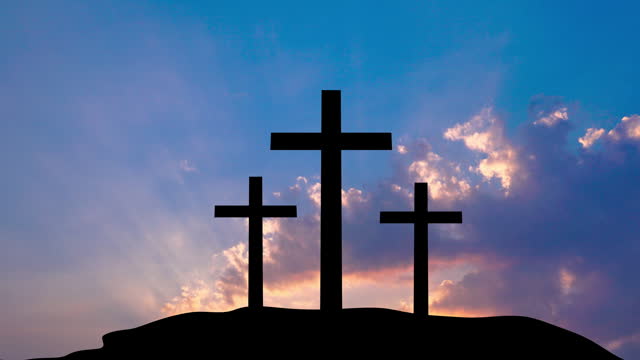 4k Time lapse : Silhouette of three christian Cross at sunset on a mountain