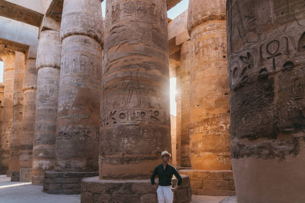 istock Asian Young Man Travelling in Karnak Temple 1532086070