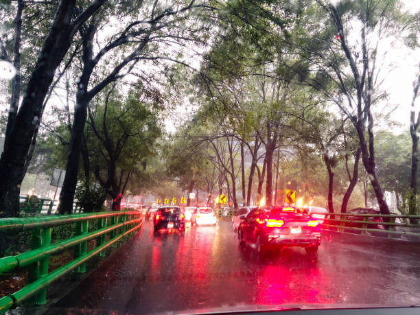 istock Driving in the rain, driver point of view. 1532097672