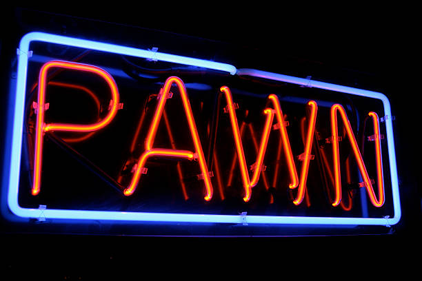 istock Neon PAWN shop sign lights up the night 153210833