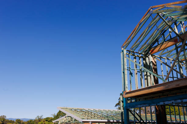 Two-storey house under construction Framework of two-storey house under construction in residential housing development australia house home interior housing development stock pictures, royalty-free photos & images