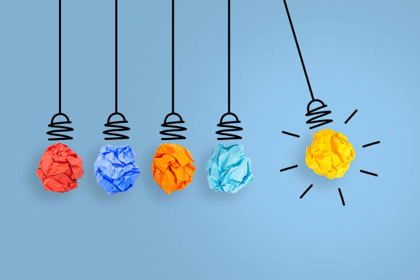 Innovative Idea Concepts with Light Bulb Crumpled Paper on Blue Background