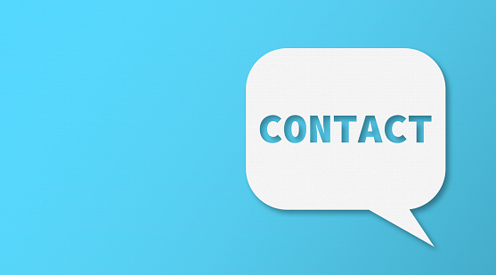 Contact and Speech Bubbles with Copy Space On Blue Cardboard Background
