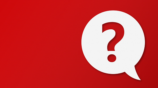 Question Mark and Speech Bubbles with Copy Space On Red Cardboard Background