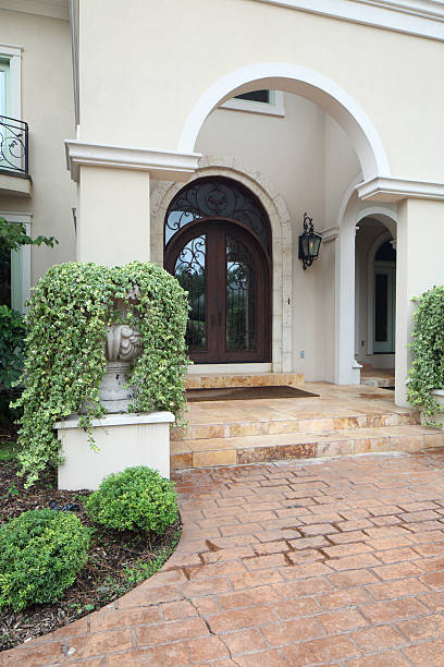 Front porch and driveway of a luxury home stock photo