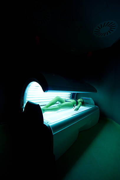 istock girl in the solarium 153217381