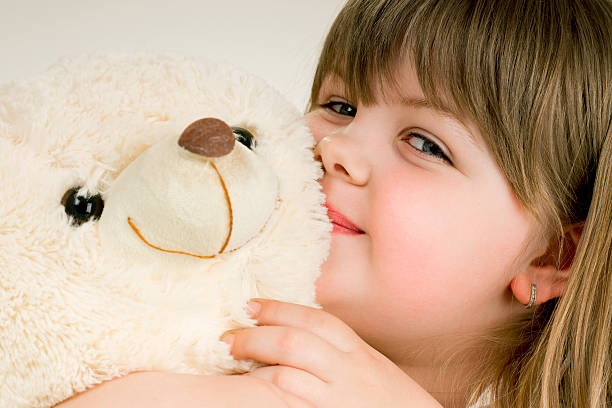 istock girl and bear 153217405