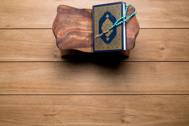 istock The Holy Al Quran with written Arabic calligraphy 1532180262