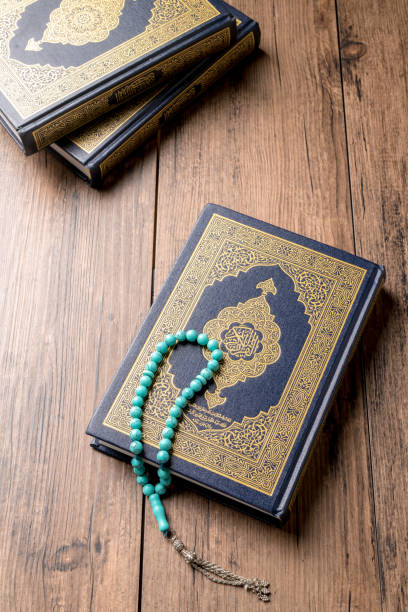 istock The Holy Al Quran with written Arabic calligraphy 1532181278