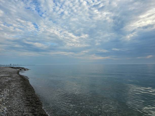 istock Huron Lake Sunset Goderich beach stones rocks cliffs clear water evening Ontario Canada landscape 1532207669