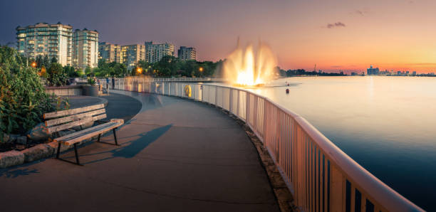 The Peace Fountain is located in a public park in Windsor, Ontario, Canada.  It is on the Detroit River.  Across the river is Detroit, Michigan, USA.