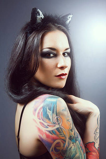 istock pretty young girl with tattoo 153227317