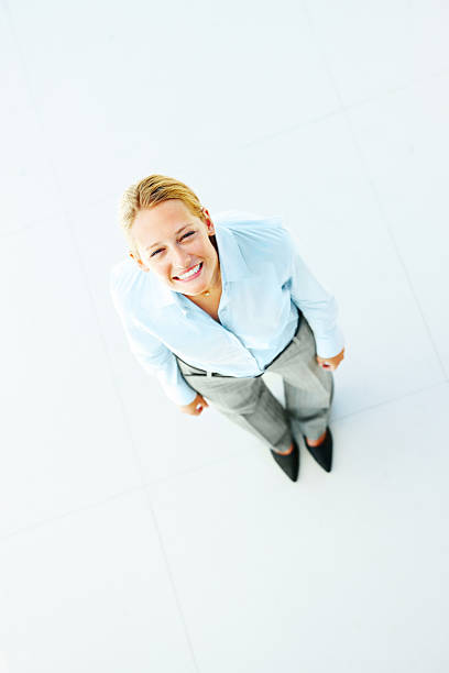 istock Businesswoman looking upwards and smiling 153227516