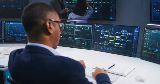 istock Team of IT technical specialists work in monitoring office 1532336831