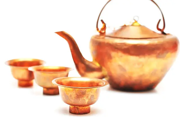 Copper tea kettle and cups