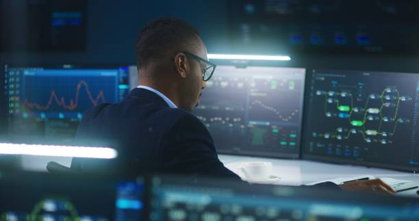 istock Software engineer works in modern monitoring control room 1532352930