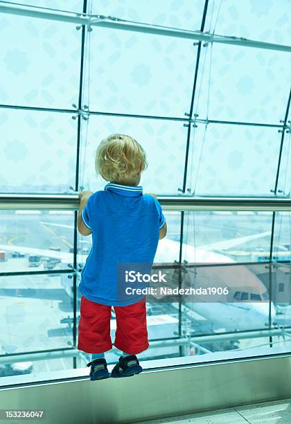 Baby Watching Planes Stock Photo - Download Image Now - Airplane, Airport, Airport Departure Area