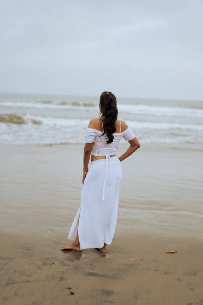 istock brunette woman on the beach 1532413137