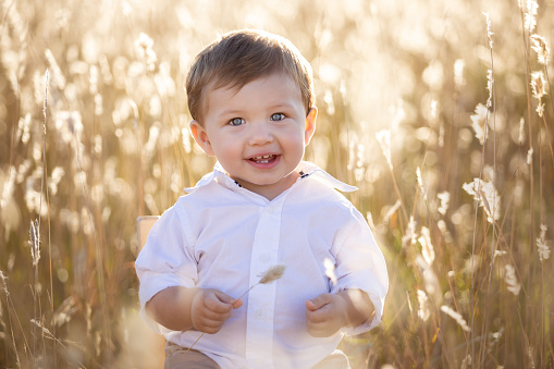 Portrait of a beautiful one year old boy at sunset - Buenos Aires - Argentina