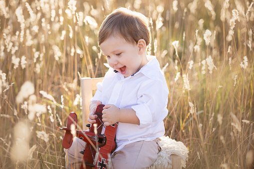 Portrait of a beautiful one year old boy at sunset - Buenos Aires - Argentina