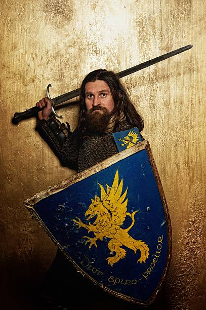 istock Medieval knight on golden background. 153243107