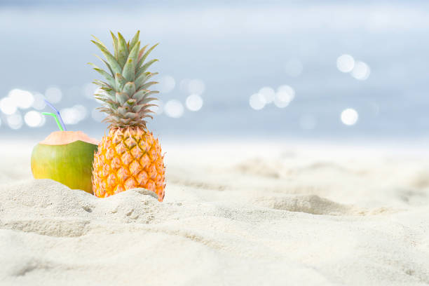 A fresh, whole pineapple set against a vibrant blue background