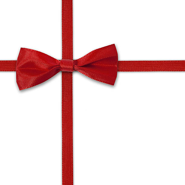 Red ribbon with bow on white background stock photo