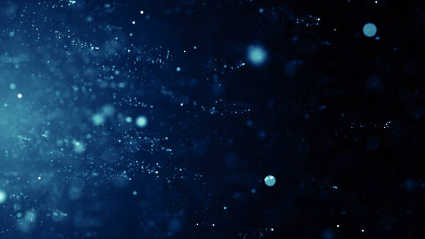 istock Particles Blue dust abstract light bokeh motion titles cinematic background 1532461228