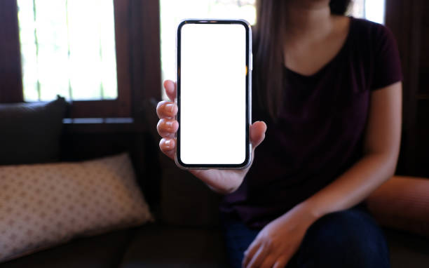 istock Women's hands holding cell telephone blank copy space screen. smart phone with technology concept. 1532462467