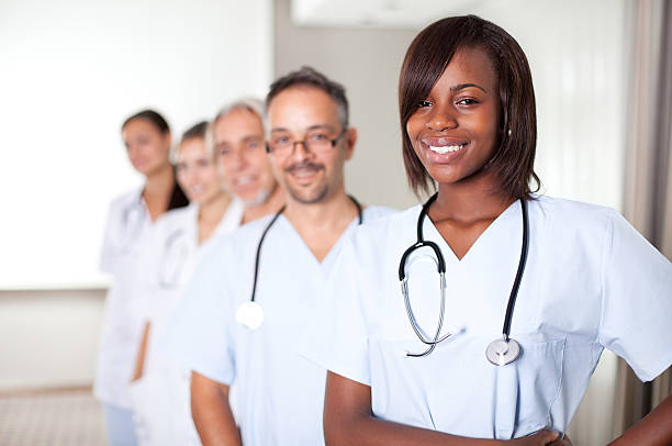 istock Multi-ethnic team of confident happy doctors 153250225